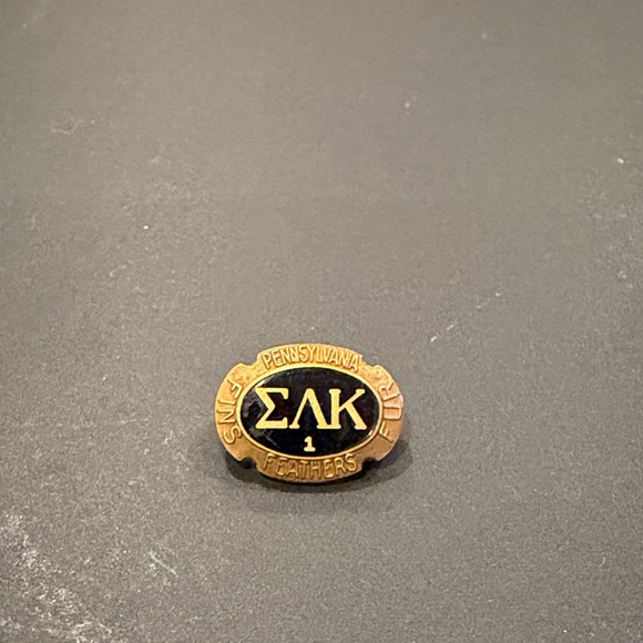 Gold and Black Fraternity Pin